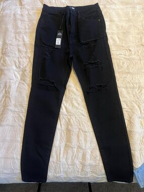 Fashion nova Black Distressed Slim Jeans size 9